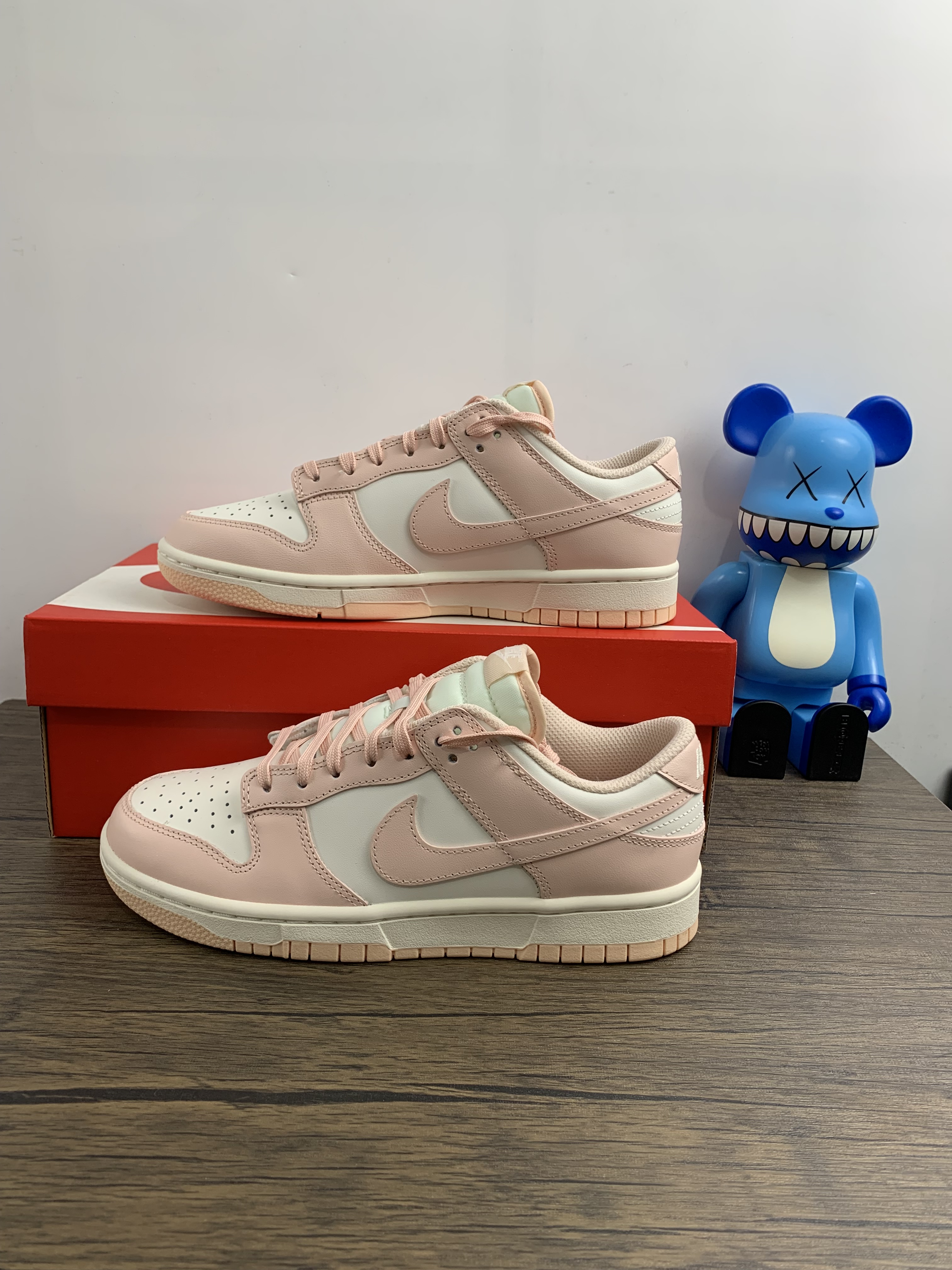 from Nike Dunk Low WMNS “Orange Pearl”