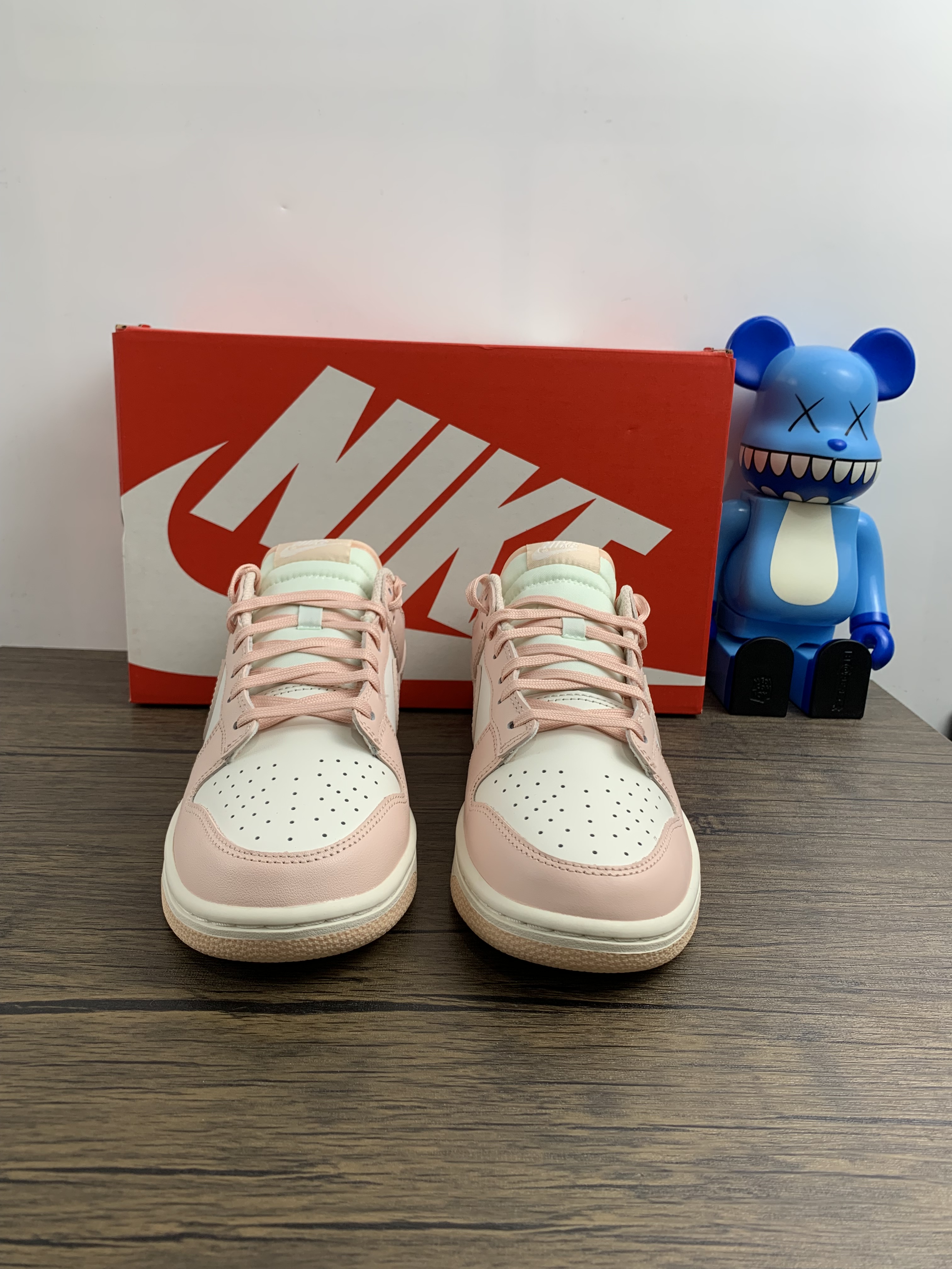 from Nike Dunk Low WMNS “Orange Pearl”